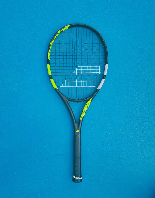 Tennis racket with strung head